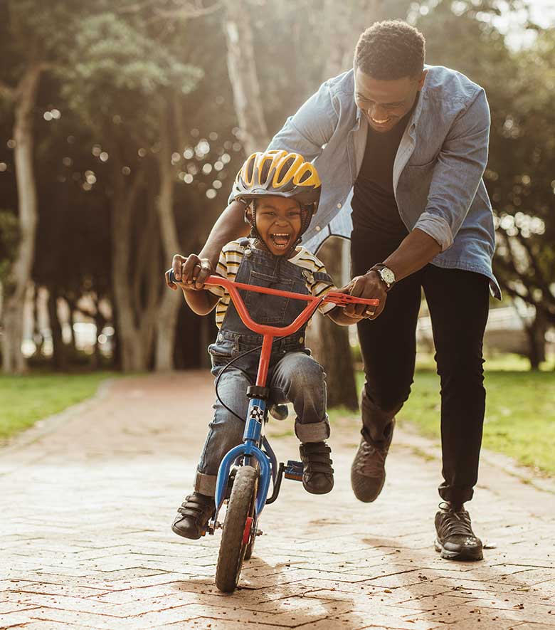 Father and son on bike